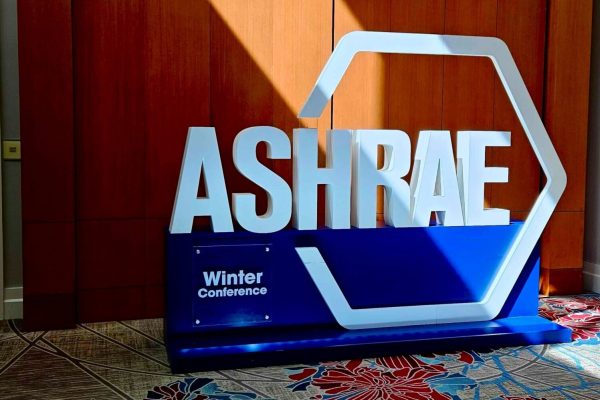 ASHRAE logo displayed at AHR 2025 conference, highlighting the organization’s leadership in HVAC and indoor air quality standards.